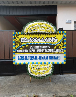 Papan Bunga Duka di Boros